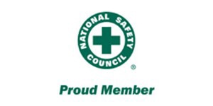 National Safety Councilin ”Proud Member” -tunnus, jossa on vihreä lääketieteellisen ristin muotoinen logo valkoisella taustalla.